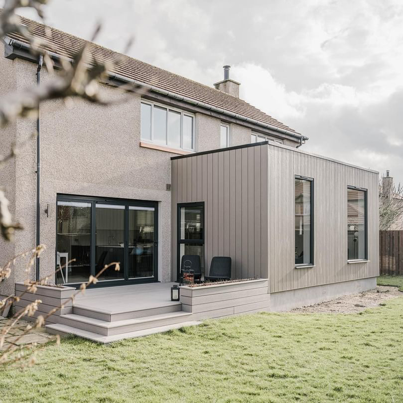 contemporary ash white composite decking boards also used to clad the house