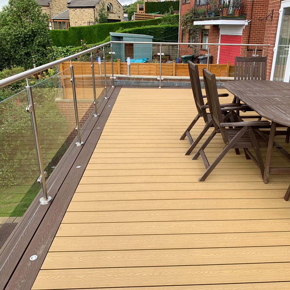 Aged Oak Composite decking with Mahogany brown composite decking picture frame by The Outdoor Look