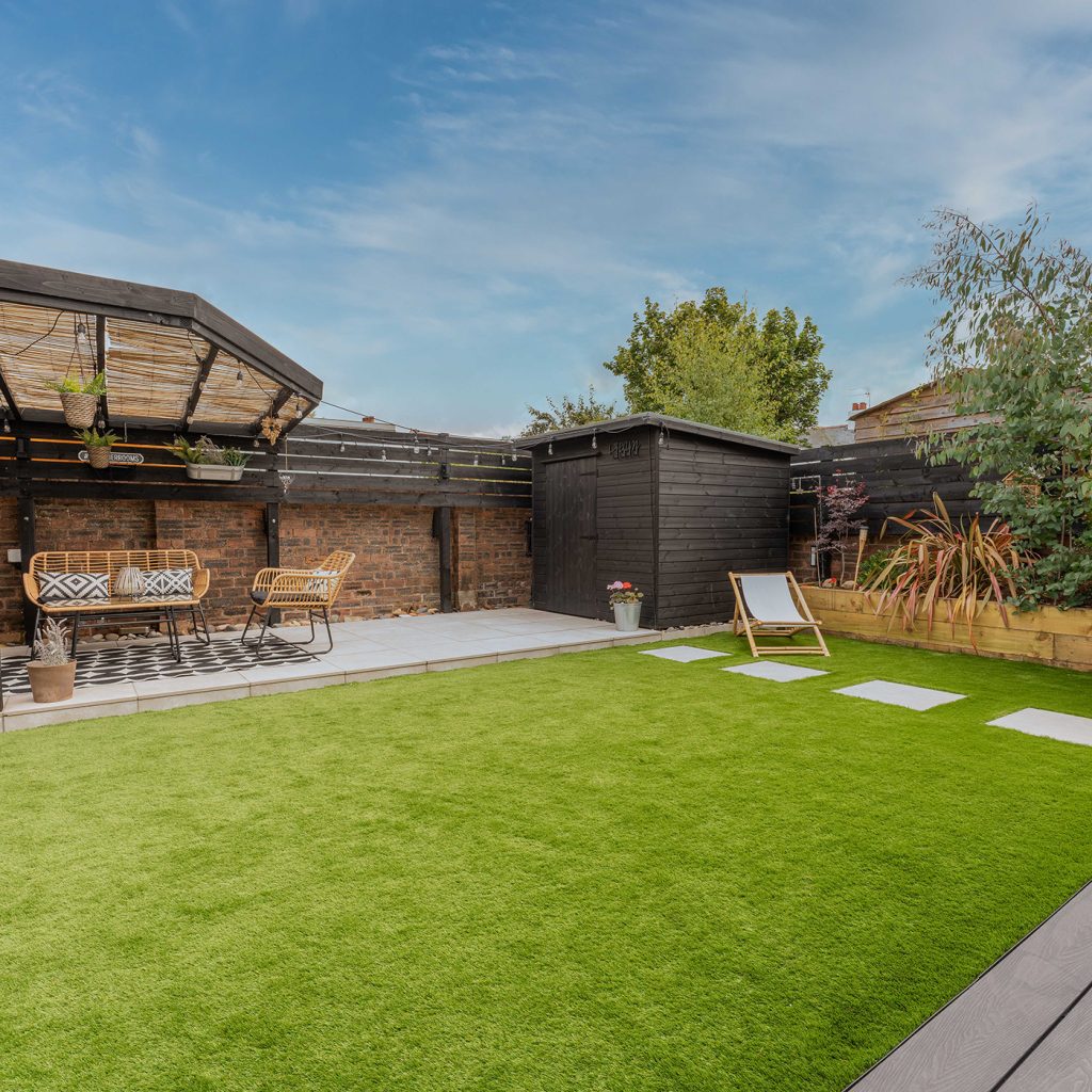 artificial grass lawn in a large family garden