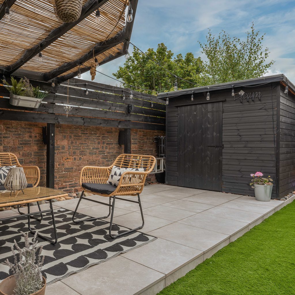 beige porcelain tiles in a low maintenance family garden