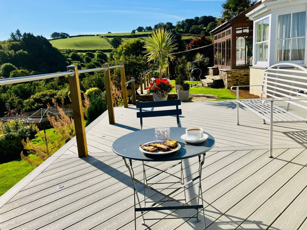 oyster beige composite boards in a large scale herringbone design