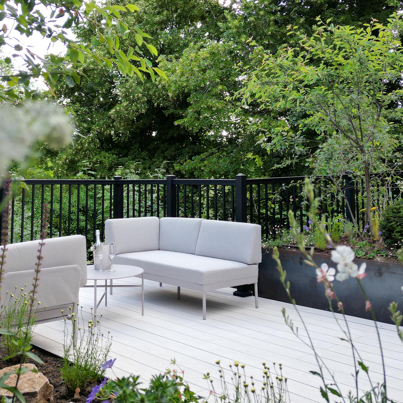 view of the black powder coated aluminium balustrade in a modern garden