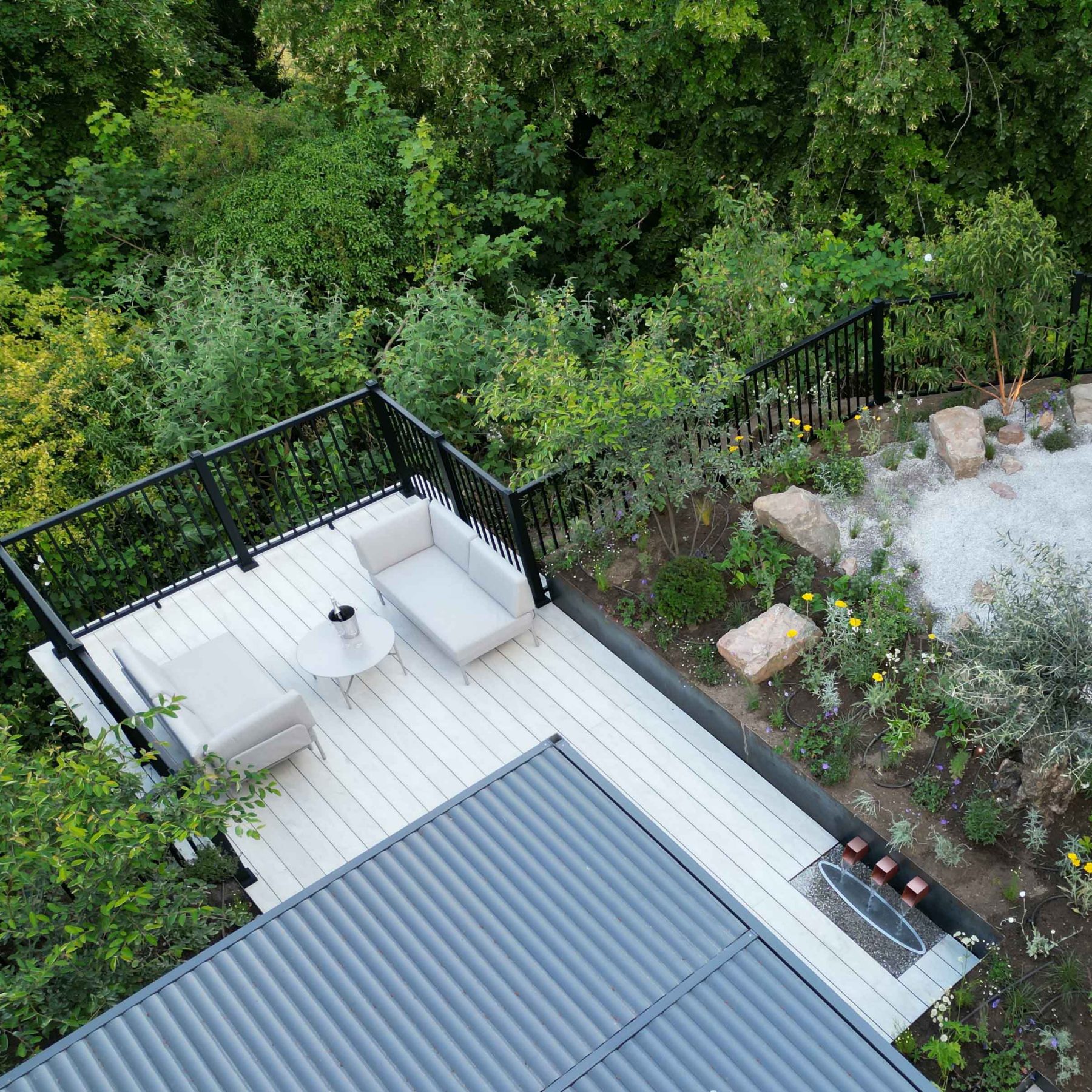 aluminium handrail, black powder coated balustrade birds eye view in a garden