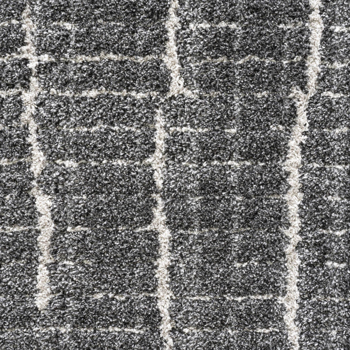 close up of dune hatched charcoal indoor modern rug