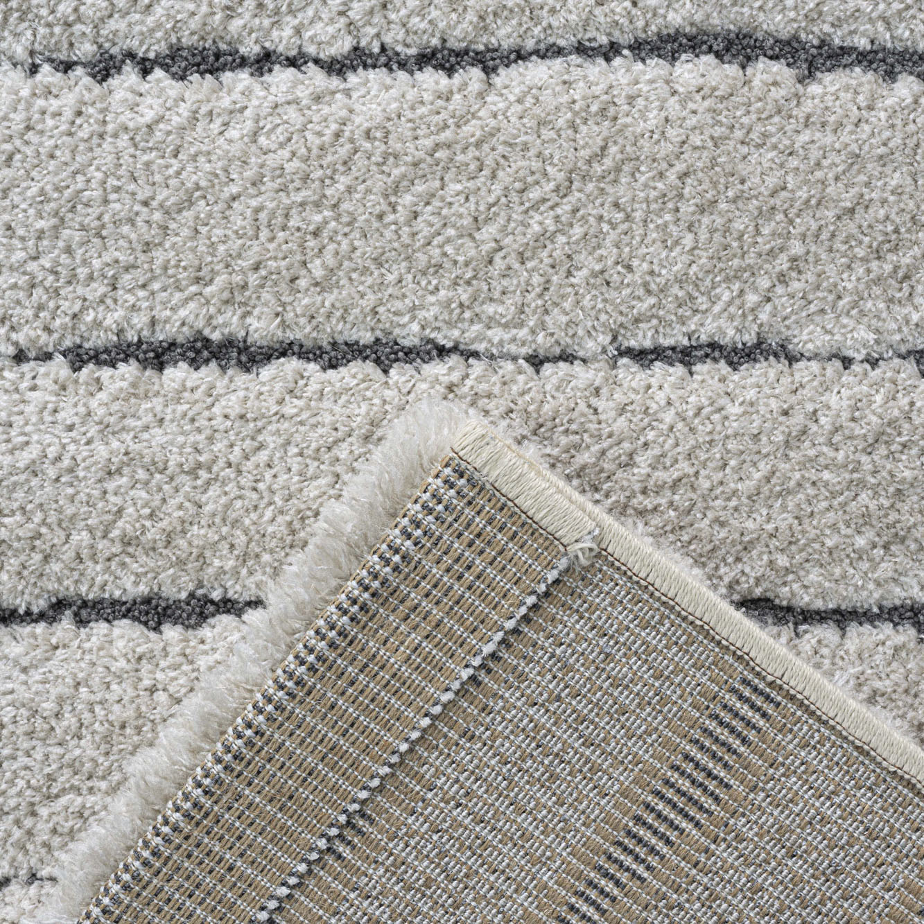 reverse of Dune stripe luxury cream and grey coloured rug