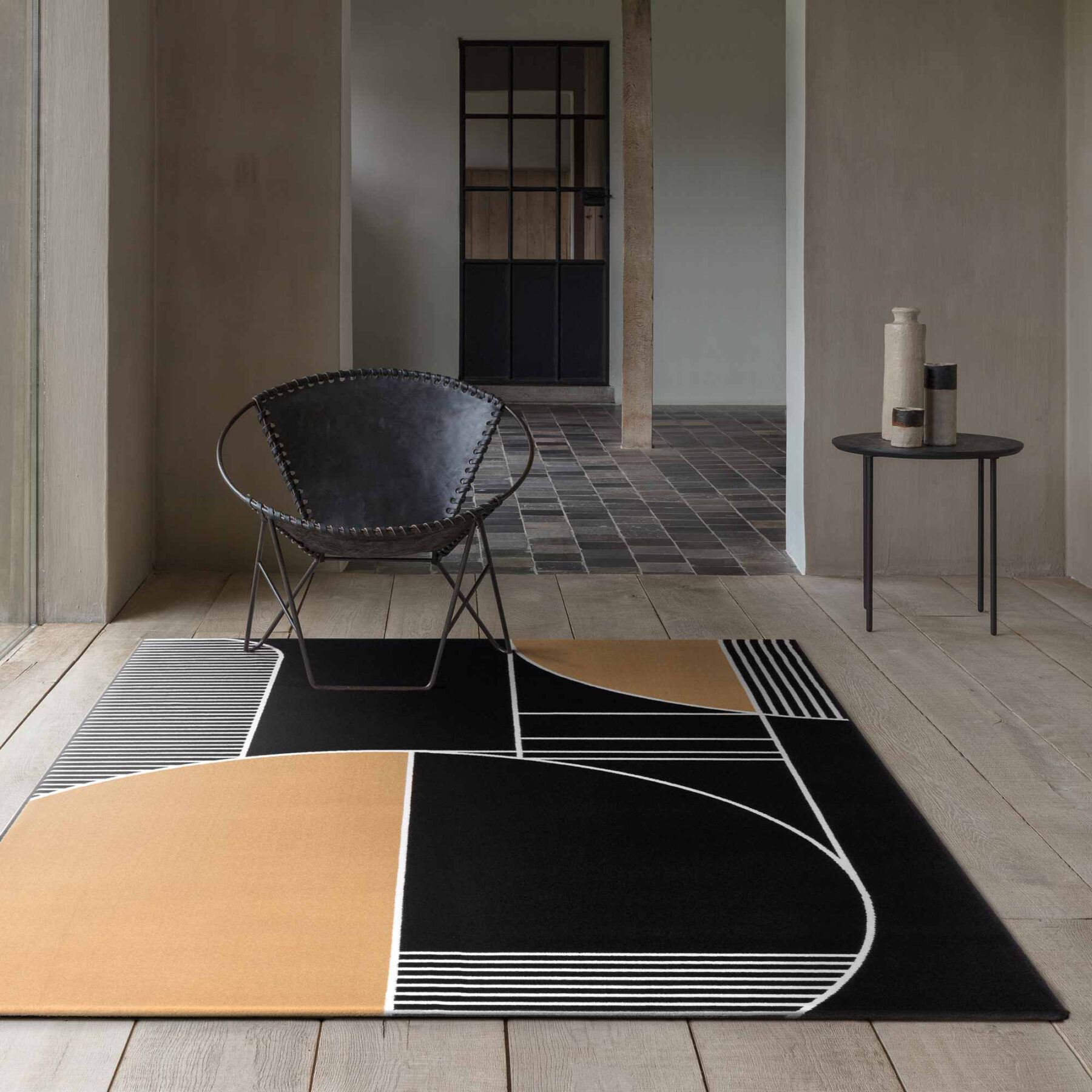 lifestyle view of Tiago structured rug in black and golden