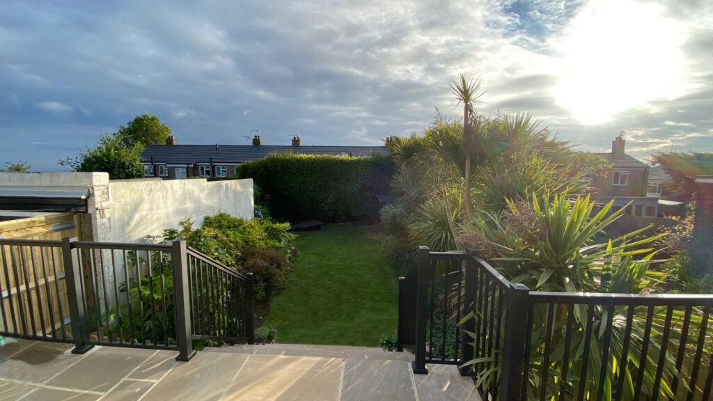 Aluminium handrail on stairs for garden patio
