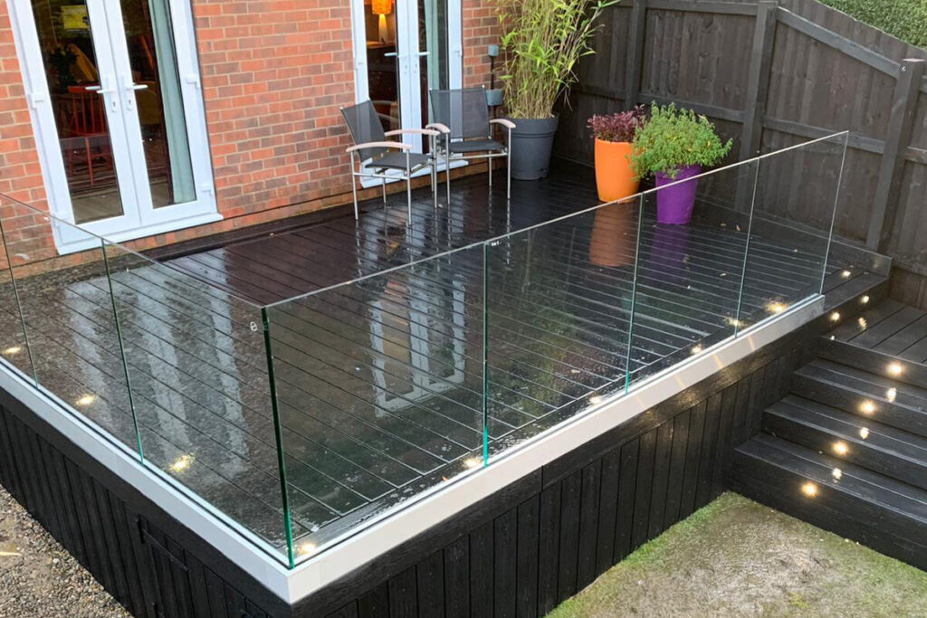 frameless glass balustrade on decking black